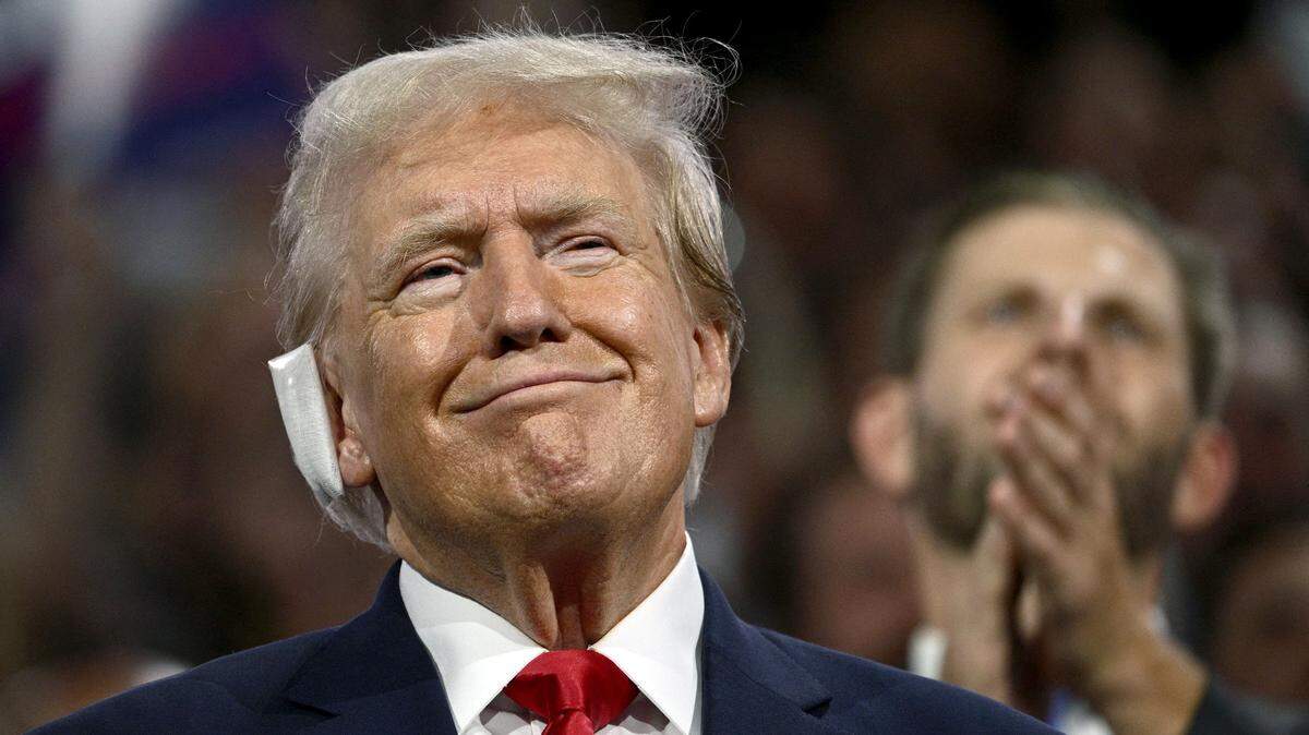 US former President and 2024 Republican presidential candidate Donald Trump, a bandage on his ear after being wounded in an assassination attempt, attends the first day of the 2024 Republican National Convention at the Fiserv Forum in Milwaukee, Wisconsin, July 15, 2024. Donald Trump won formal nomination as the Republican presidential candidate and picked a right-wing loyalist for running mate, kicking off a triumphalist party convention in the wake of last weekend’s failed assassination attempt. (Brendan Smialowski/AFP/Getty Images/TNS)