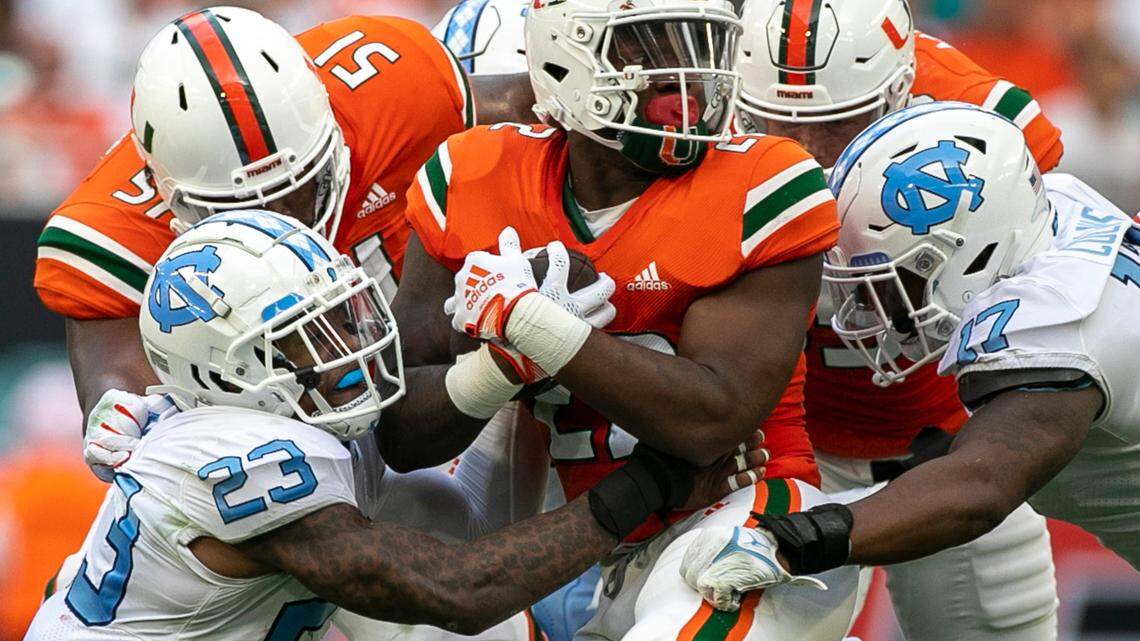 North Carolina’s Power Echols (23) stops Miami’s Thaddeus Franklin Jr. (22) on Saturday, October 8, 2022 at Hard Rock Stadium in Miami Gardens, Florida.