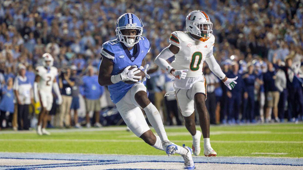 North Carolina wide receiver Devontez Walker (9) scores on an 18-yard pass completion from quarterback Drake Maye to give the Tar Heels a 7-0 lead in the first quarter on Saturday, October 14, 2023 at Kenan Stadium in Chapel Hill, N.C.