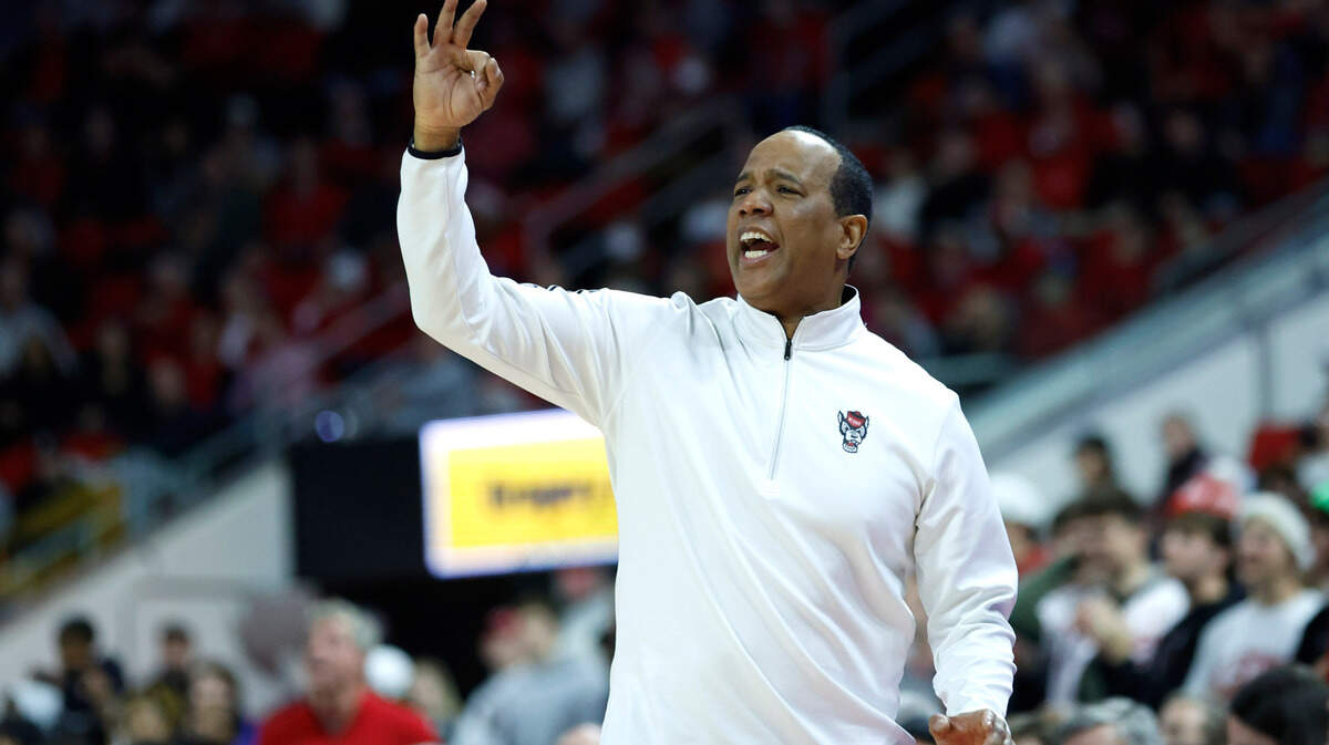 N.C. State head coach Kevin Keatts instructs the team during the second half of N.C. State’s 76-64 victory over Louisville at PNC Arena in Raleigh, N.C., Thursday, Dec. 22, 2022.