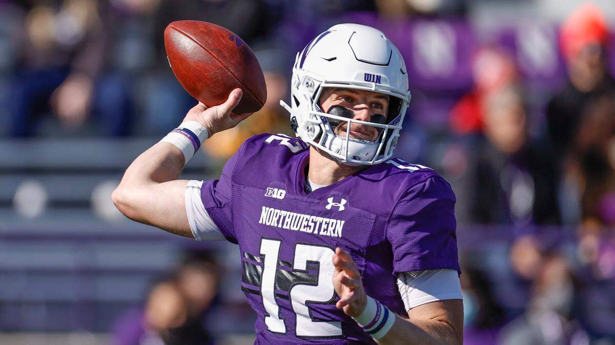 FILE - Northwestern quarterback Ryan Hilinski (12) looks to pass the ball during the first half of an NCAA football game against Rutgers on Saturday, Oct. 16, 2021, in Evanston, Ill. Nebraska’s defense knows Ryan Hilinski from last season but it’s also preparing for a Dublin surprise or two at quarterback against Northwestern in the Irish capital on Saturday, Aug. 27, 2022. (AP Photo/Kamil Krzaczynski, File)