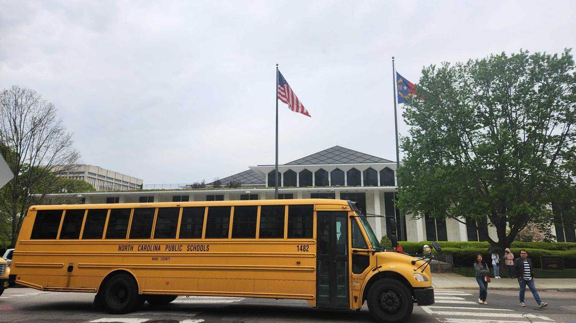 A Wake County Public Schools System bus waits outside the N.C. Legislative Building in downtown Raleigh on Tuesday, April 9, 2024.