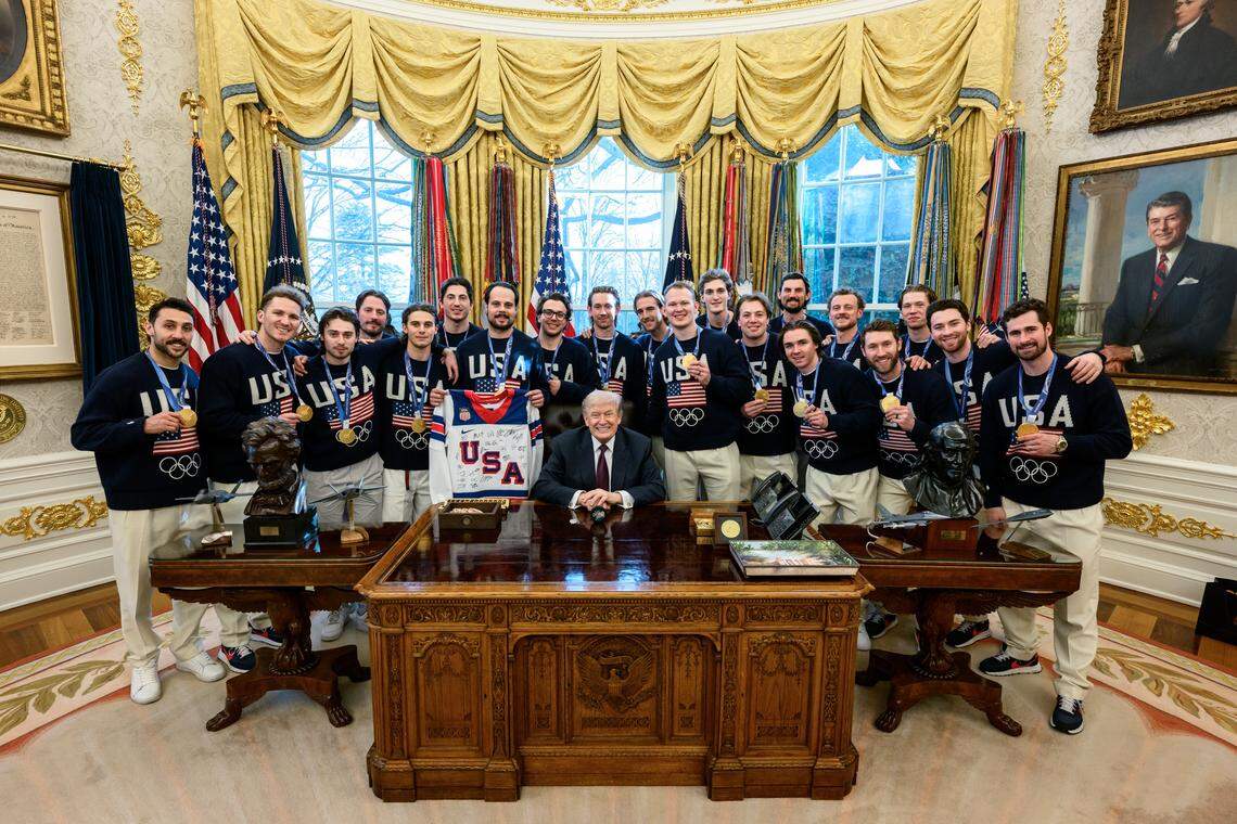 President Donald Trump poses with members of U.S. men’s Olympic hockey team at the White House on Feb. 24, 2026.