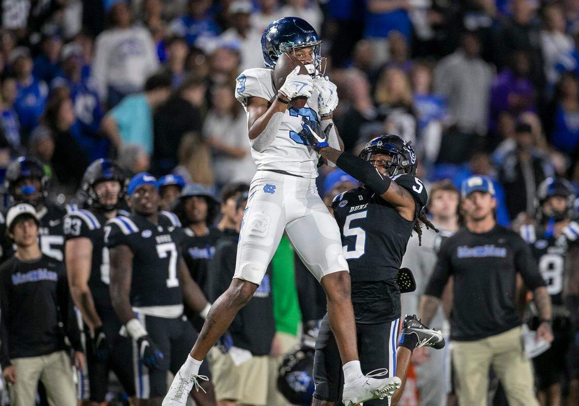 North Carolina’s Antoine Green (3) pulls in a 53-yard pass from quarterback Drake Maye (10) over Duke’s Datrone Young (5) in the first quarter on Saturday, October 15, 2022 at Wallace-Wade Stadium in Durham, N.C.