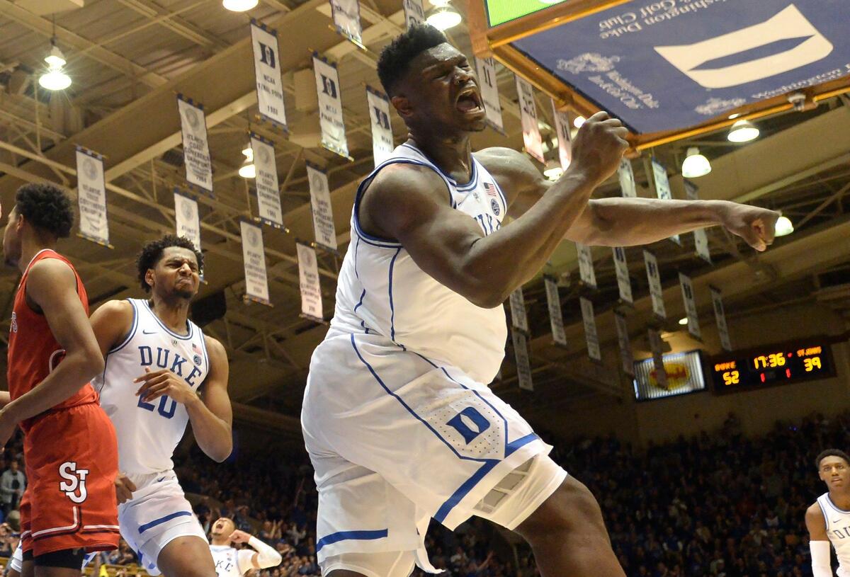 Duke Blue Devils forward Zion Williamson (1) reacts after a slam dunk against St. John’s. Duke Blue Devils center Marques Bolden (20) is in the background celebrating. Duke defeated St. John’s 91-61at Cameron Indoor Stadium In Durham, N.C. Saturday, Feb. 2, 2019.