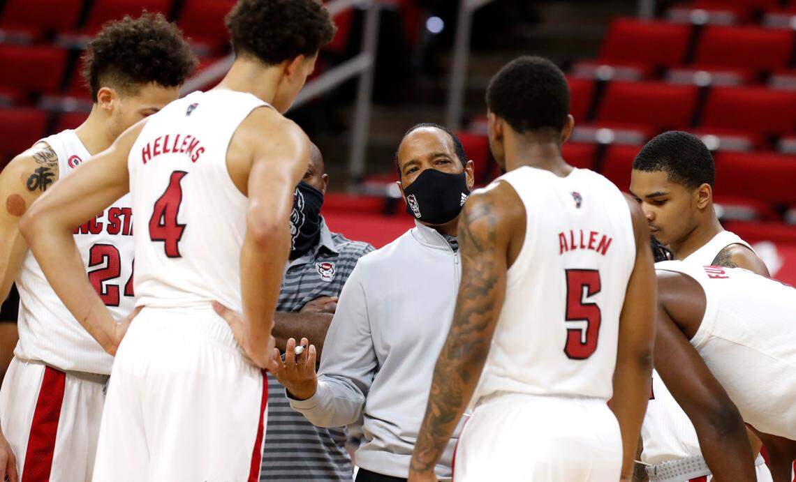 N.C. State head coach Kevin Keatts talks with his team during the second half of N.C. State’s 79-76 victory over Boston College at PNC Arena in Raleigh, N.C., Wednesday, December 30, 2020.