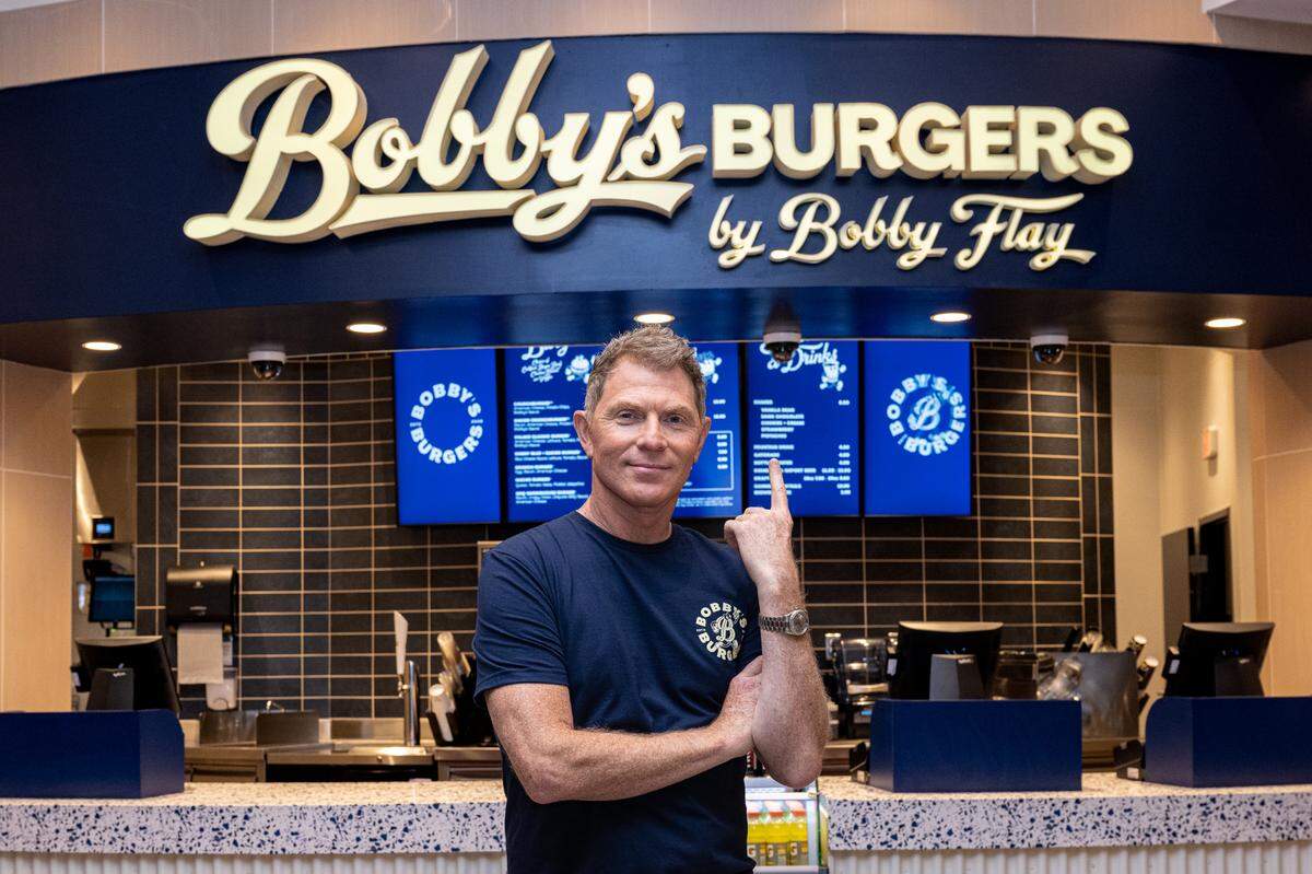 Celebrity chef Bobby Flay’s burger restaurant Bobby’s Burgers will open in RDU’s Terminal 2 on Nov. 22.  
