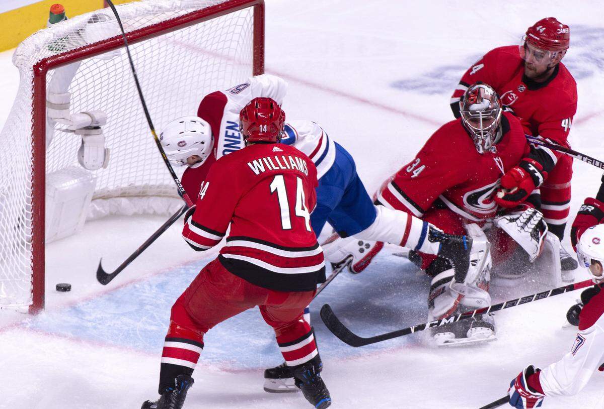 Montreal Canadiens’ Artturi Lehkonen scores past Carolina Hurricanes goaltender Petr Mrazek during the third period of an NHL hockey game, Thursday, Dec. 13, 2018 in Montreal. (Paul Chiasson/The Canadian Press via AP)