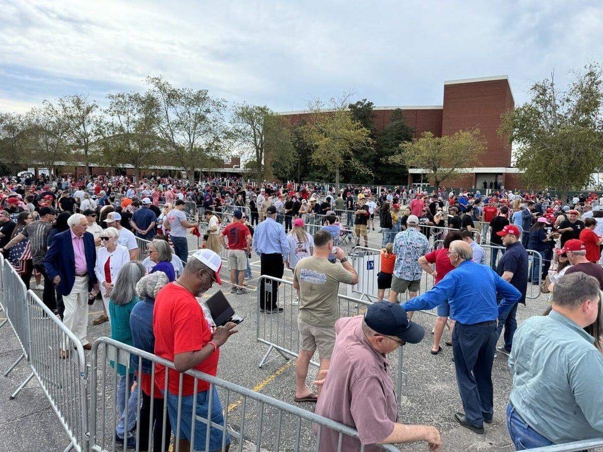 A crowd waits to get into the Crown Arena on Friday, Oct. 4, 2024, to see former President Donald Trump.