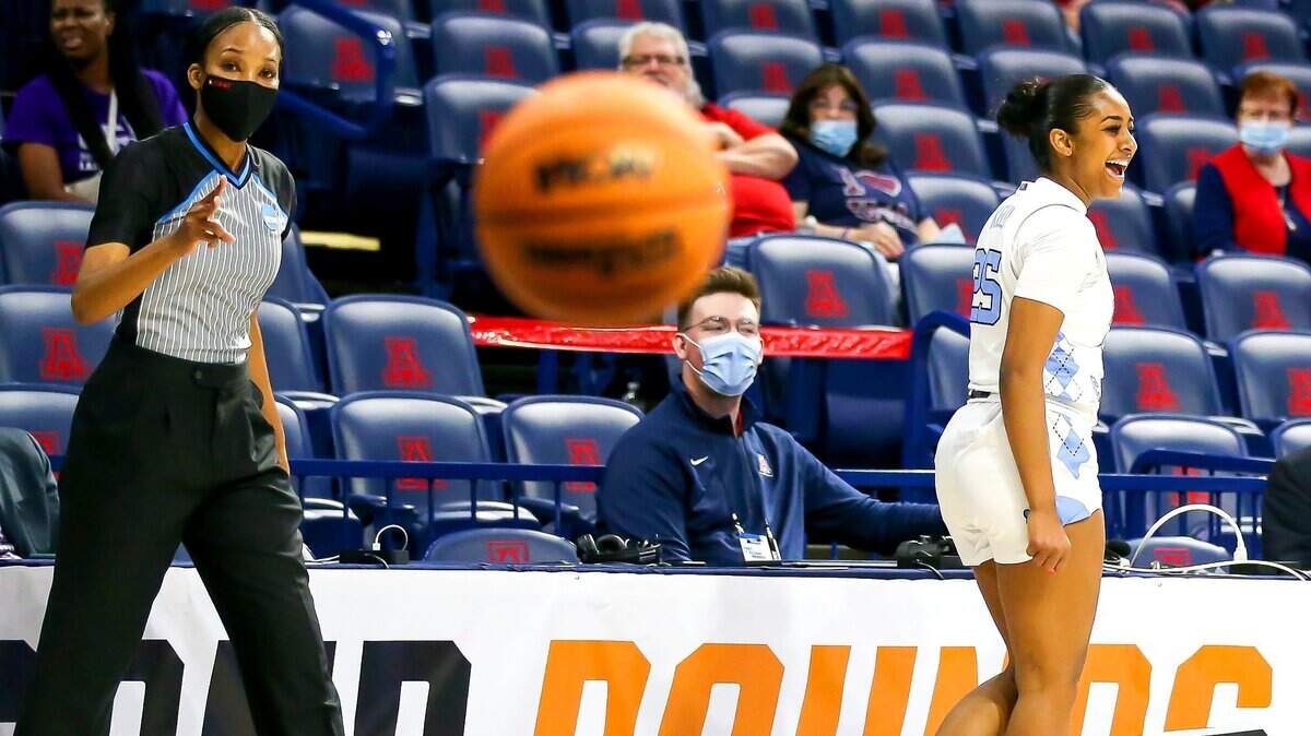 North Carolina guard Deja Kelly (25) celebrates after being fouled on her 3-point shot against Stephen F. Austin during a first-round game in the NCAA women’s college basketball tournament Saturday, March 19, 2022, in Tucson, Ariz. (Rebecca Sasnett/Arizona Daily Star via AP)