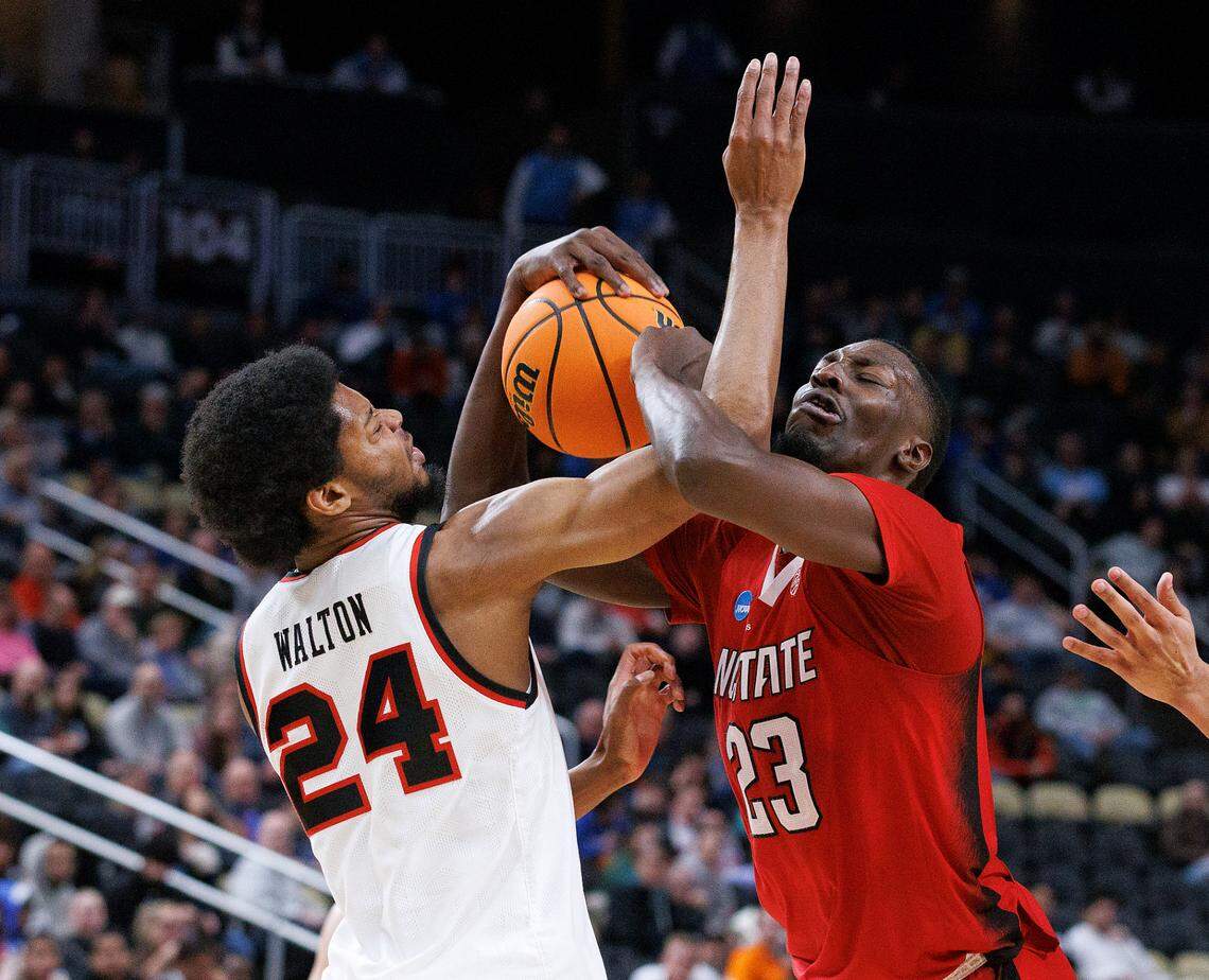 N.C. State’s Mohamed Diarra pulls down a rebound over Texas Tech’s Kerwin Walton during the second half of the Wolfpack’s 80-67 win in the first round of the NCAA Tournament on Thursday, March 21, 2024, at PPG Paints Arena in Pittsburgh, Pa.
