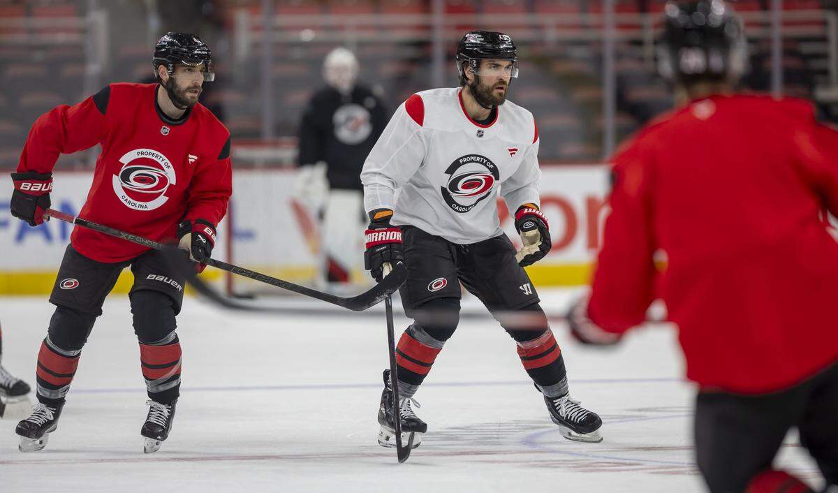 Carolina Hurricanes defenseman Shayne Gostisbehere (4) and left wing Taylor Hall (71) skate during their practice on Monday June 1, 2026 at Lenovo Center in Raleigh, N.C.
