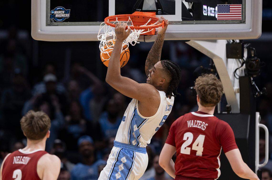 North Carolina’s Armando Bacot (5) gets a dunk over Alabama’s Rylan Griffen (3) and Sam Walters (24) in the second half in the NCAA Sweet Sixteen on Thursday, March 28, 2024 at Crypto.com Arena in Los Angeles, CA.