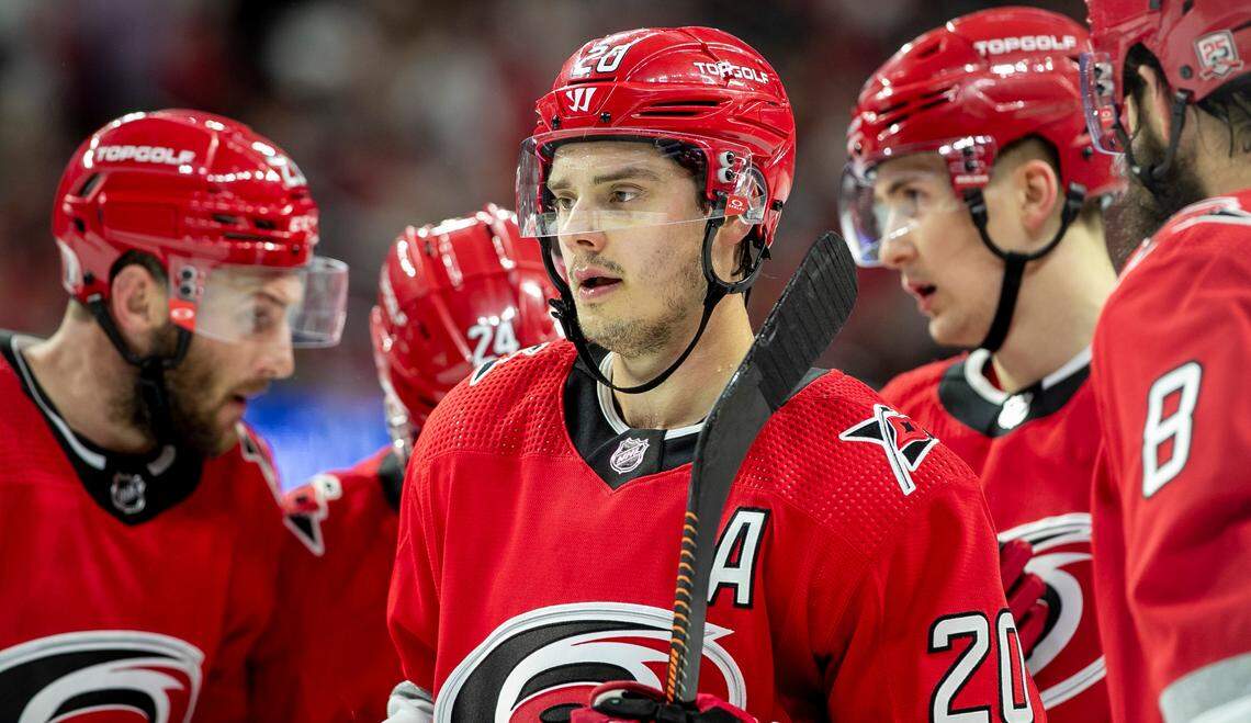 The Carolina Hurricanes Sebastian Aho (20) huddles with his teammates as they begin a power play in the first period against the New York Islanders during Game 5 of their Stanley Cup series on Tuesday, April 25, 2023 at PNC Arena in Raleigh, N.C.