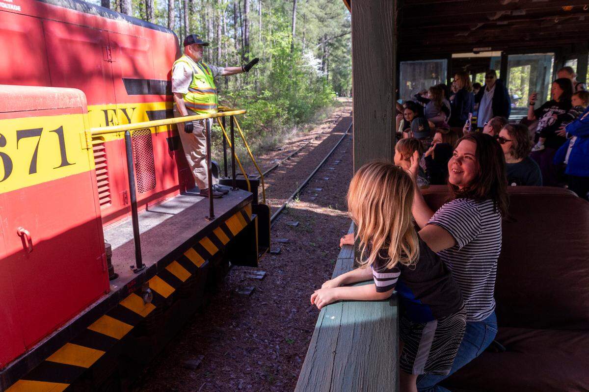 Passengers ride the New Hope Valley Railway in Bonsal on April 12, 2024. The nonprofit railway celebrates its 40th year taking passengers on rides in southwest Wake County.