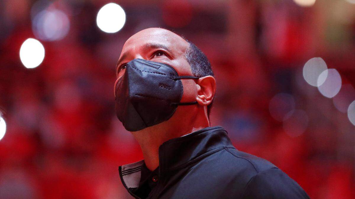 N.C. State head coach Kevin Keatts watches the hype video before N.C. State’s game against Wake Forest at PNC Arena in Raleigh, N.C., Wednesday, Feb. 9, 2022.