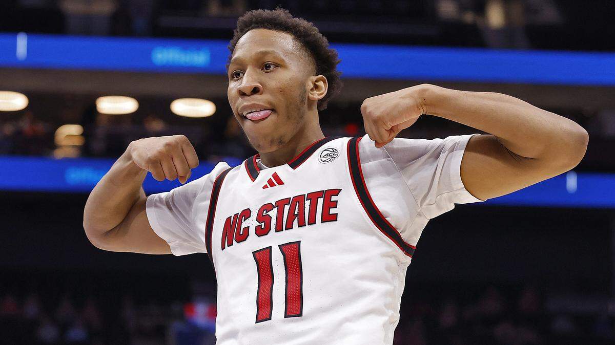 N.C. State's Quadir Copeland reacts after a reverse dunk during the second half of the Wolfpack’s 98-88 win over Pitt in the second round of the ACC Tournament on Wednesday, March 11, 2026, at the Spectrum Center in Charlotte, N.C. 