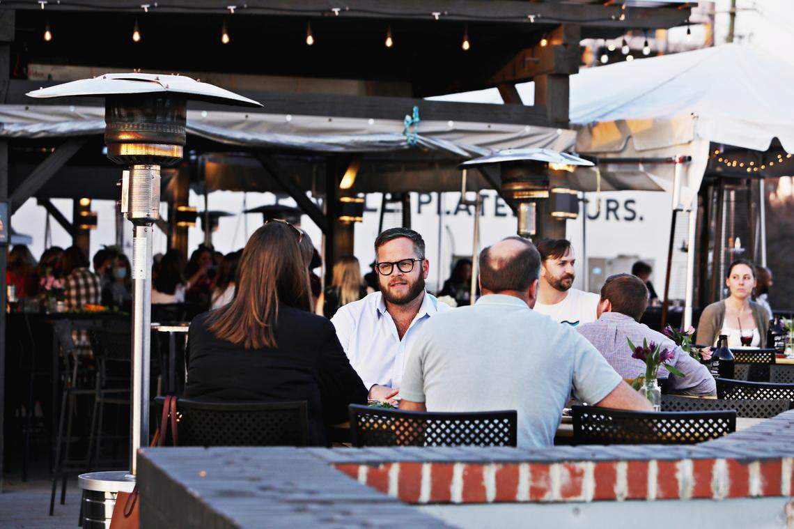 Guests fill up the outdoor patio at Wye Hill in downtown Raleigh on Wednesday March 10, 2021.