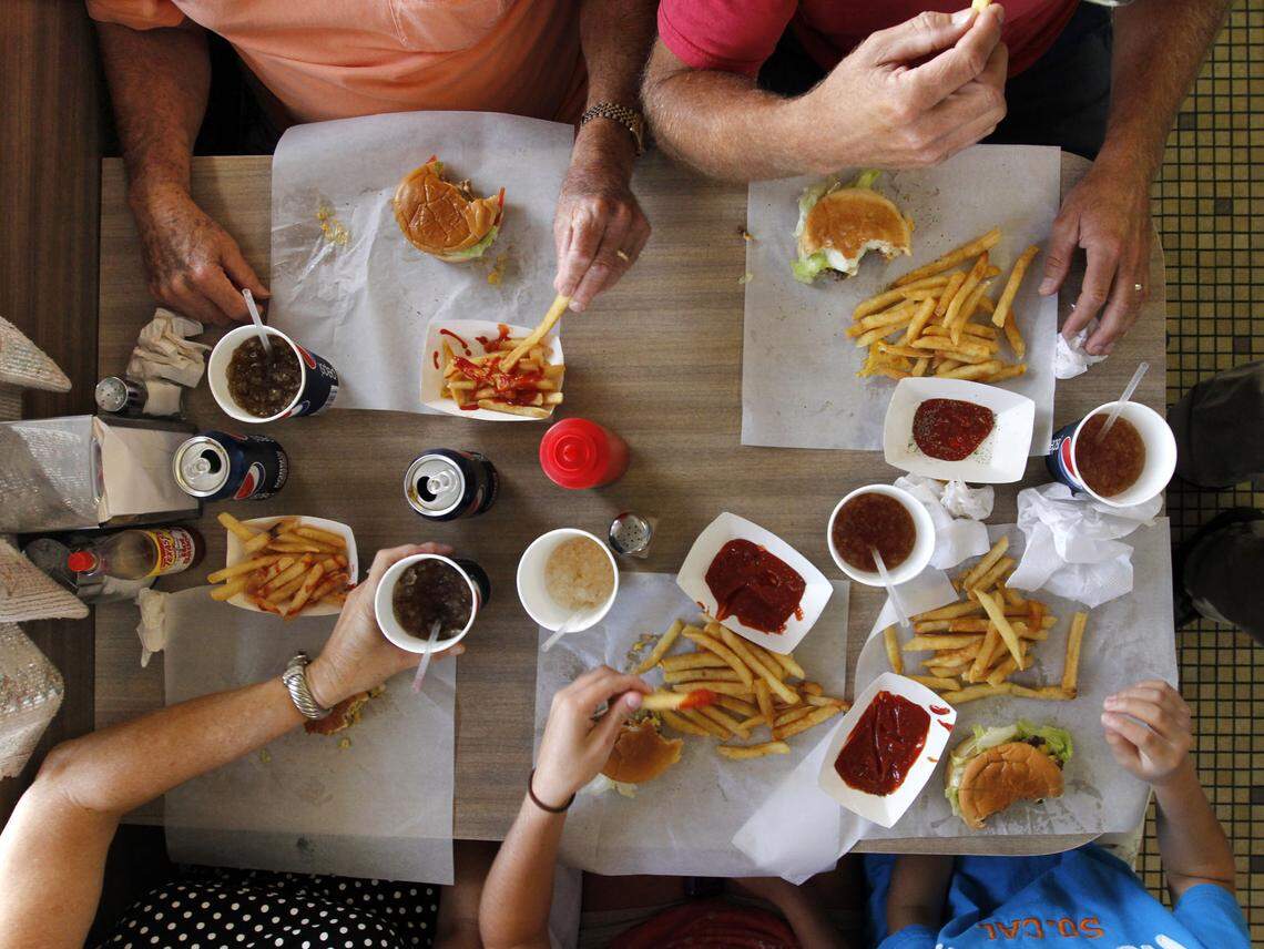Patron’s at Johnson’s in Siler City enjoy the famous cheeseburgers and fries with ketchup along with a Pepsi or sweet tea.