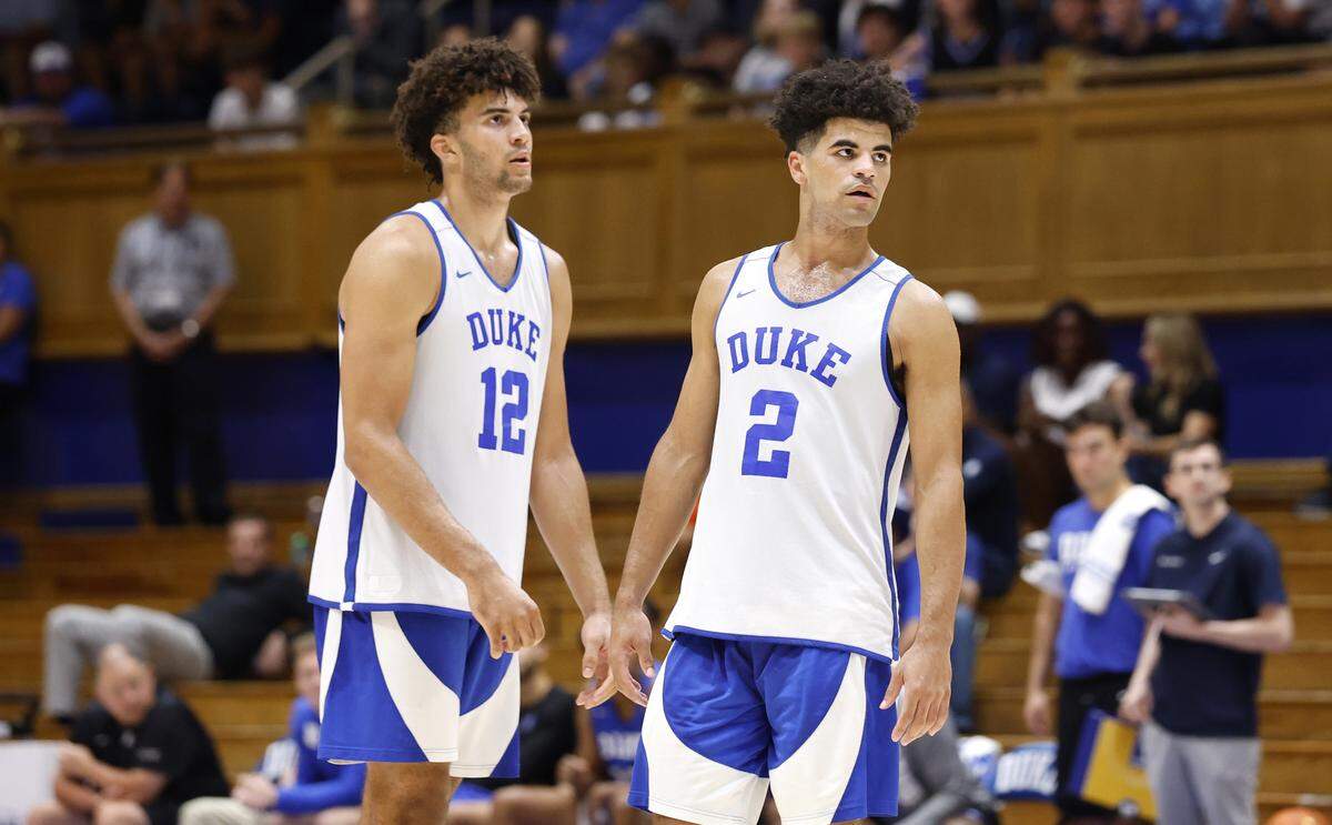 Duke’s Cameron Boozer (12) and twin Cayden Boozer (2) participate in a scrimmage during the Blue Devils’ open practice at Cameron Indoor Stadium in Durham, N.C., Tuesday, August 5, 2025.