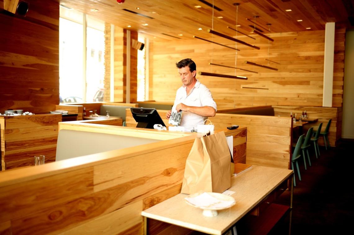 The dining room of Jack Tar is a cheery contemporary space with an open kitchen and service that is friendly and relaxed.