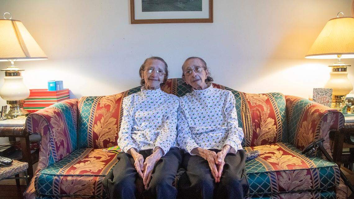Identical twins and Raleigh natives Kathleen Stephenson, left, and Alean Chavis will celebrate their one hundredth birthday on New Years Eve.
