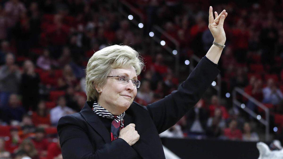 N.C. State athletic director Debbie Yow acknowledges the crowd as she is recognized during the first half of N.C. State’s game against Georgia Tech at PNC Arena in Raleigh In March 2019.