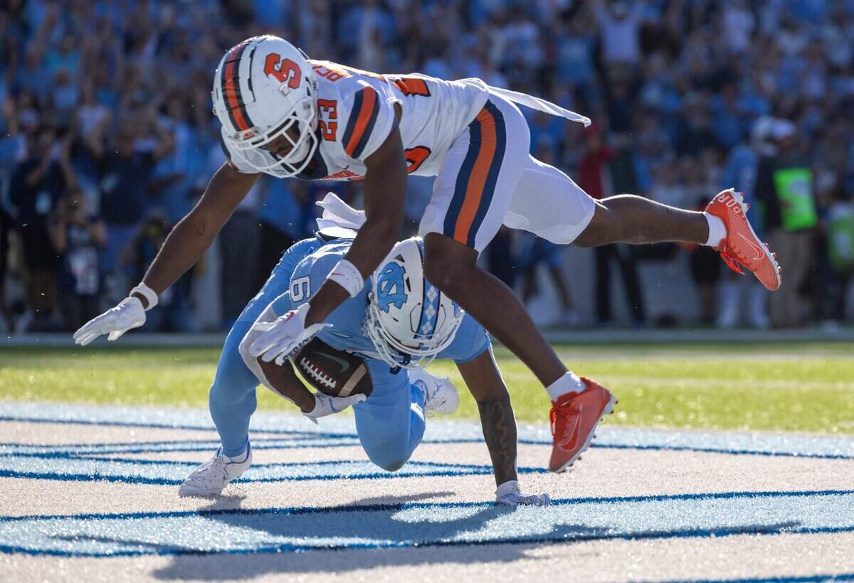 North Carolina’s Nate McCollum (6) tumbles into the end zone after being downed at the one-yard line on a 48-yard pass completion from quarterback Drake Maye to set up a touchdown in the second quarter on Saturday, October 7, 2023 at Kenan Stadium in Chapel Hill, N.C.