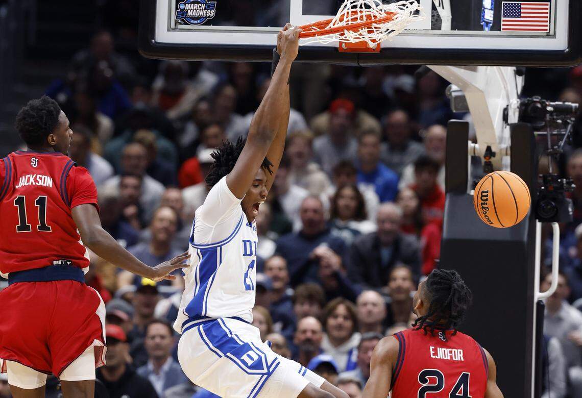 Duke’s Patrick Ngongba II (21) celebrates slamming in two in the first half of Duke’s game against St. John’s in the Sweet 16 of the NCAA Men’s Basketball East Regional at Capital One Arena in Washington, D.C., Friday, March 27, 2026.