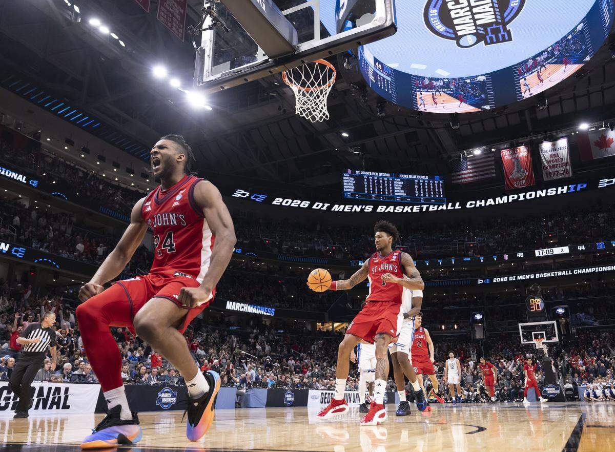 St. John’s forward Zuby Ejiofor (24) reacts after a dunk in the first half against Duke during the Sweet Sixteen of the NCAA Tournament on Friday, March 27, 2026, at Capital One Arena in Washington, D.C. Ejiofor lead St. John’s with 17 points. 