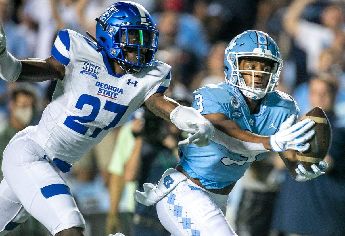 North Carolina’s Antoine Green (3) pulls in a 57-yard pass from quarterback Sam Howell for a touchdown in the second quarter to give the Tar Heels a 14-0 lead over Georgia State on Saturday, September 11, 2021 at Kenan Stadium in. Chapel Hill, N.C.