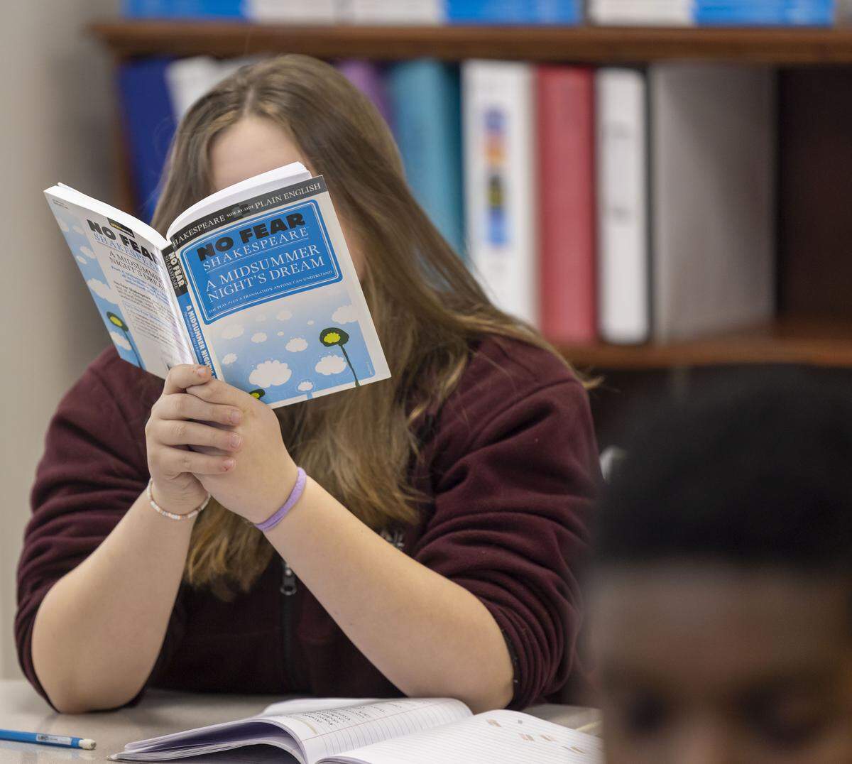 Adelaide Ortego reads in her English, Language Arts class at St. Catherine of Siena Catholic School on Thursday, February 12, 2026 in Wake Forest, N.C.