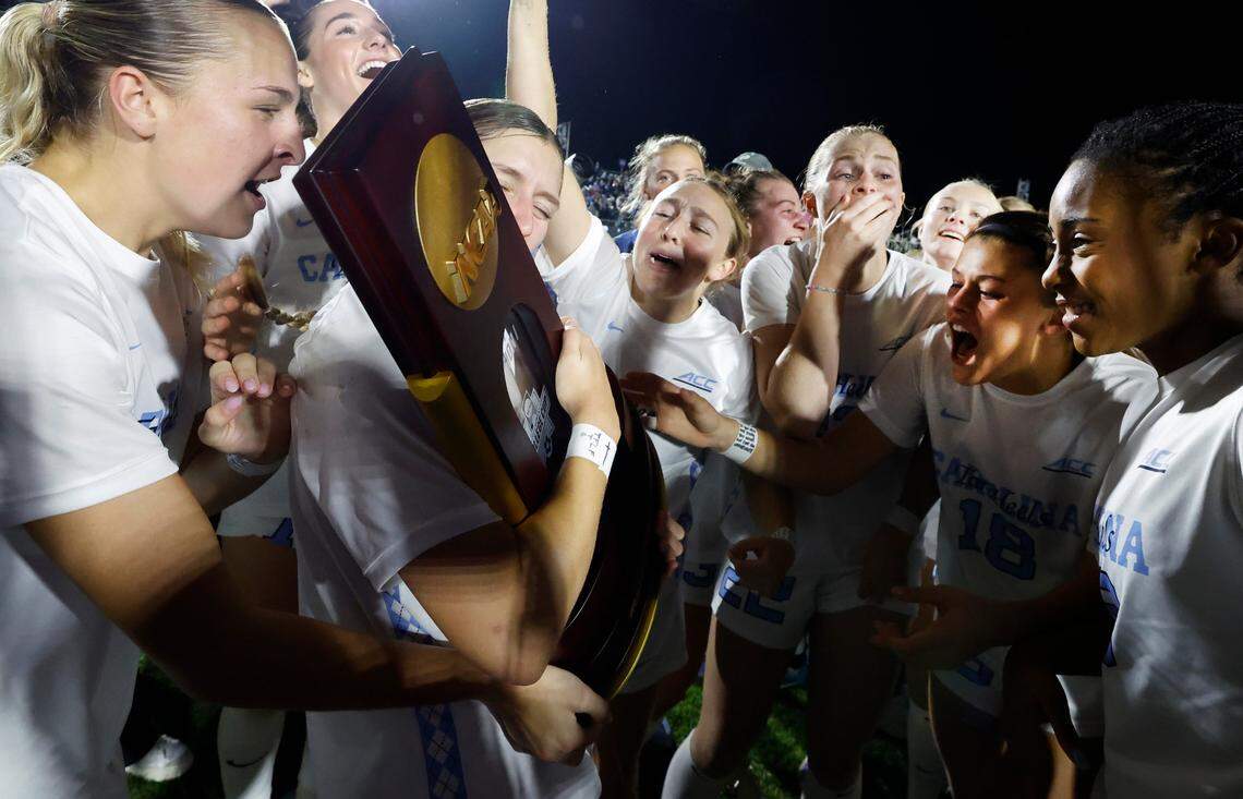 North Carolina’s Emerson Elgin (6) kisses the championship trophy after UNC’s 1-0 victory over Wake Forest in the finals of the 2024 Women’s College Cup at WakeMed Soccer Park in Cary, N.C., Monday, Dec. 9, 2024.