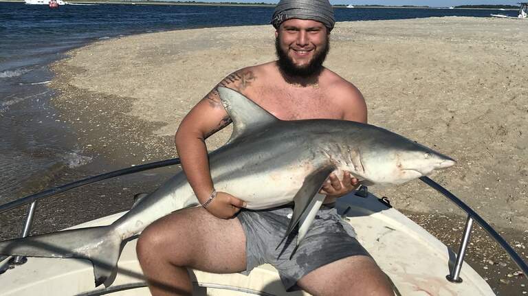 Just in time for Shark Week: NCCU’s Erik Schlecker reels in impressive catch