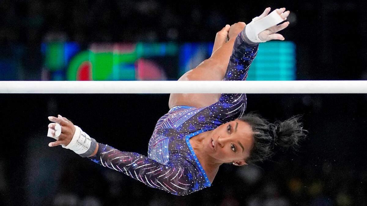 Simone Biles competes on the uneven in the women’s gymnastics all-around during the Paris 2024 Olympic Summer Games at Bercy Arena.