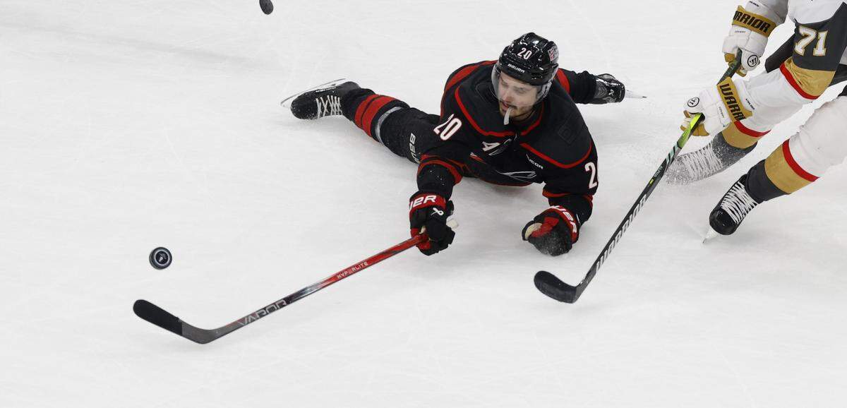Carolina's Sebastian Aho (20) goes after the puck in the first period of the Hurricanes’ game against the Golden Knights in the first game of the Stanley Cup Final at the Lenovo Center in Raleigh, N.C., Tuesday, June 2, 2026.