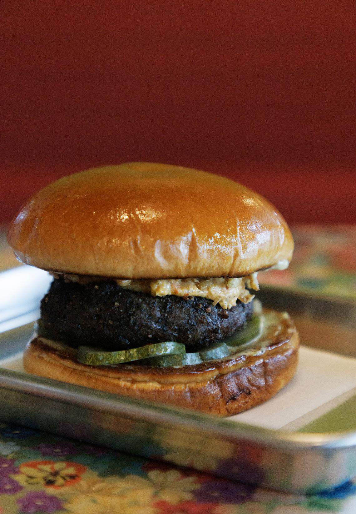 The smoked burger is pictured at Jaguar Bolera in Raleigh, N.C. on Tuesday, May 14, 2024.