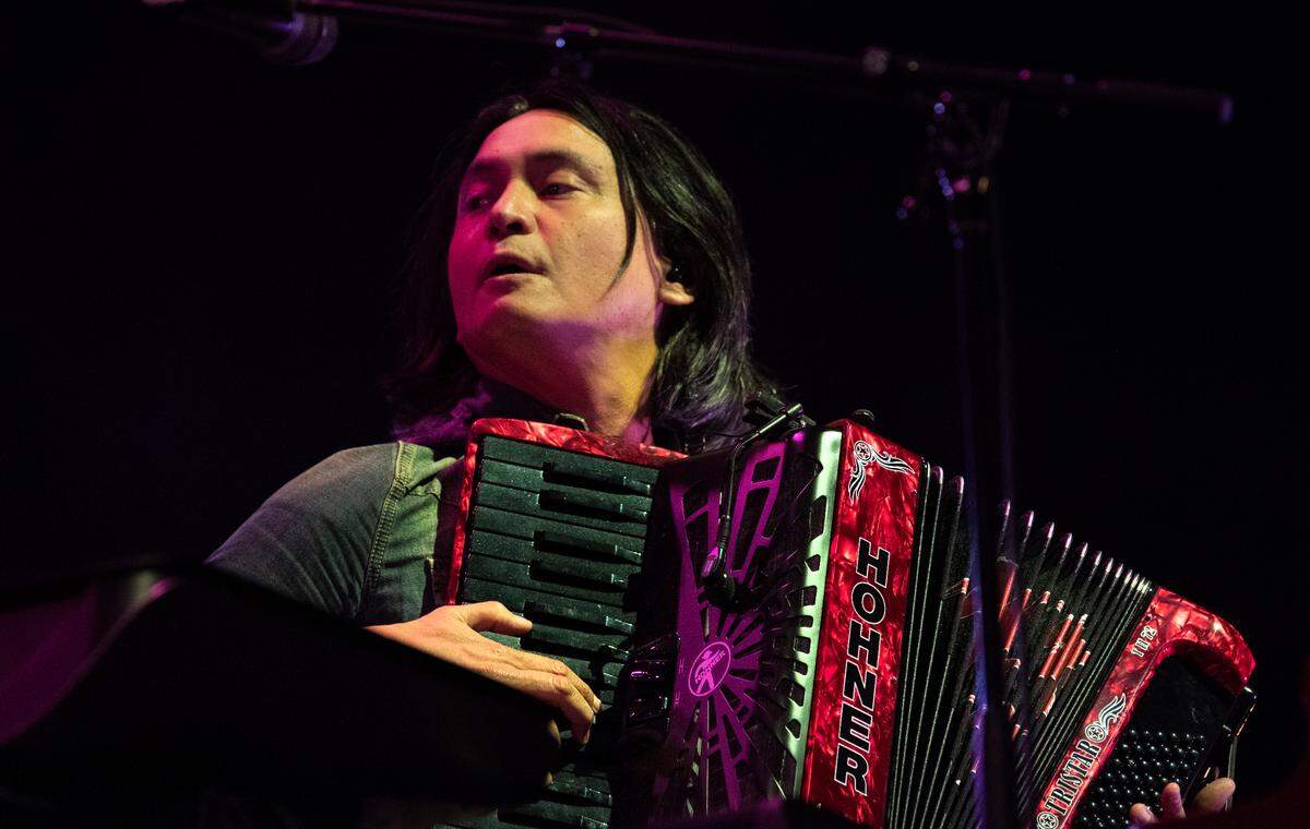 Derry DeBorja plays the accordion as he performs with Jason Isbell and the 400 Unit in concert with Durand Jones, Saturday night, Oct. 7, 2023 supporting Band Together’s Mighty Giveback.