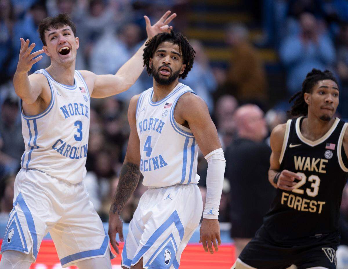 North Carolina’s Cormac Ryan (3) reacts after three-point basket by R.J. Davis to give the Tar Heels a commanding 85-61 lead over Wake Forest in the final minute of play on Monday, January 22, 2024 at the Smith Center in Chapel Hill, N.C. Davis led all scores with 36 points in their 85-64 victory.