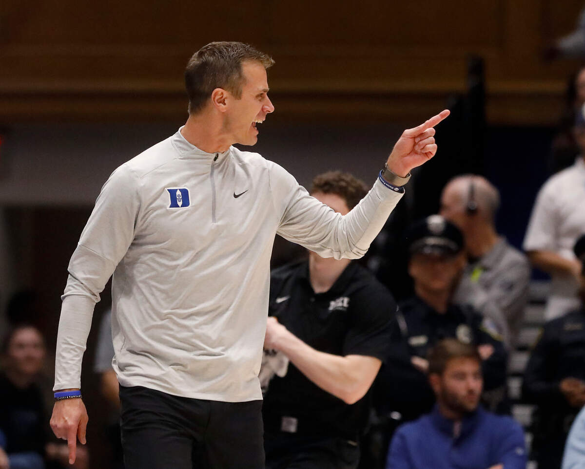 Duke head coach Jon Scheyer gives instructions during the first half of the Blue Devils’ 68-47 win over George Mason on Tuesday, Dec. 17, 2024, at Cameron Indoor Stadium in Durham, N.C.
