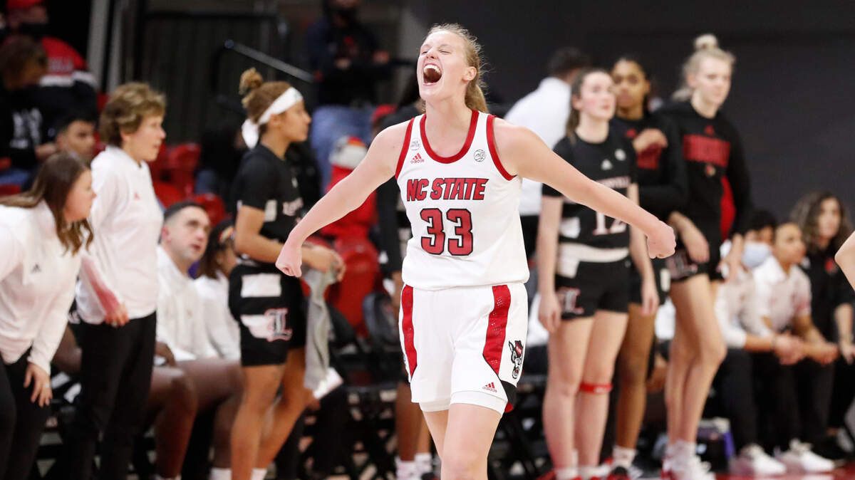 N.C. State’s Elissa Cunane (33) celebrates as time runs out in the game during N.C. State’s 68-59 victory over Louisville at Reynolds Coliseum in Raleigh, N.C., Thursday, Jan. 20, 2022.