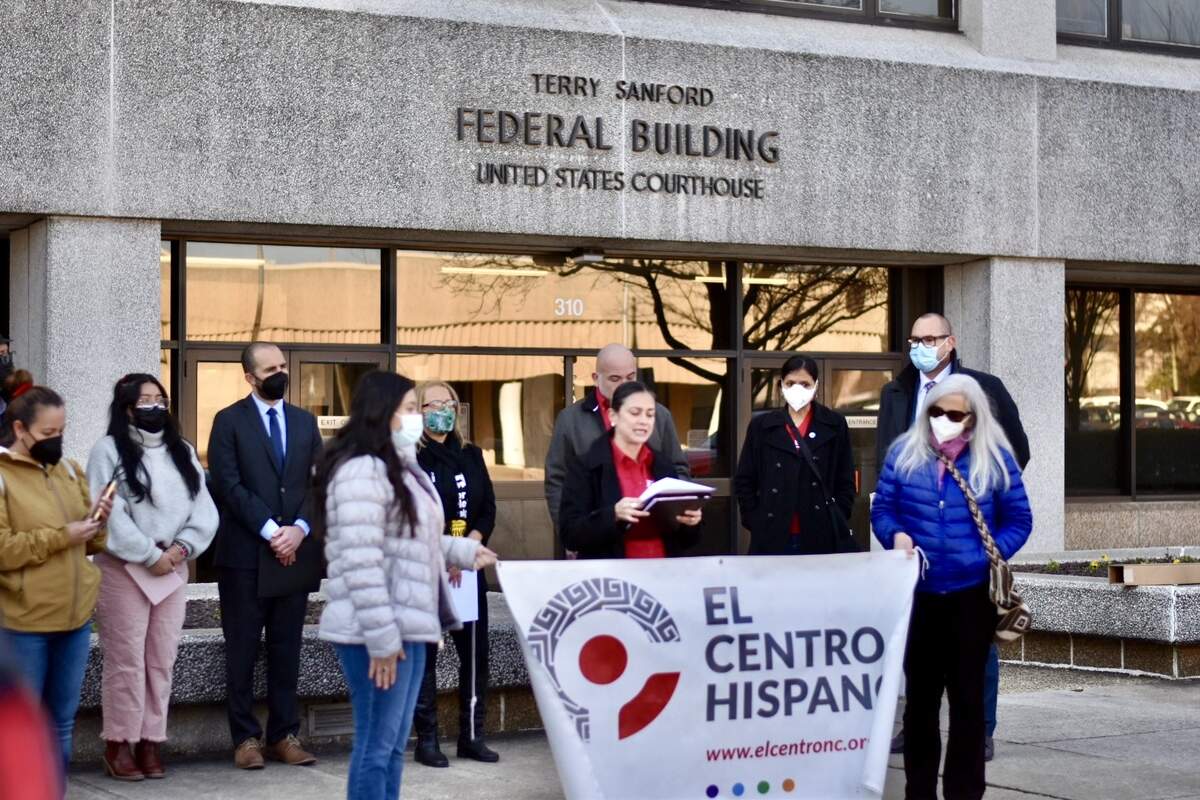 Members and allies of El Colectivo NC gathered in front the Terry Sanford Federal Building, where U.S. Sen. Thom Tillis’ office is located in Raleigh, demanding for comprehensive immigration reform on Feb. 14, 2022.
