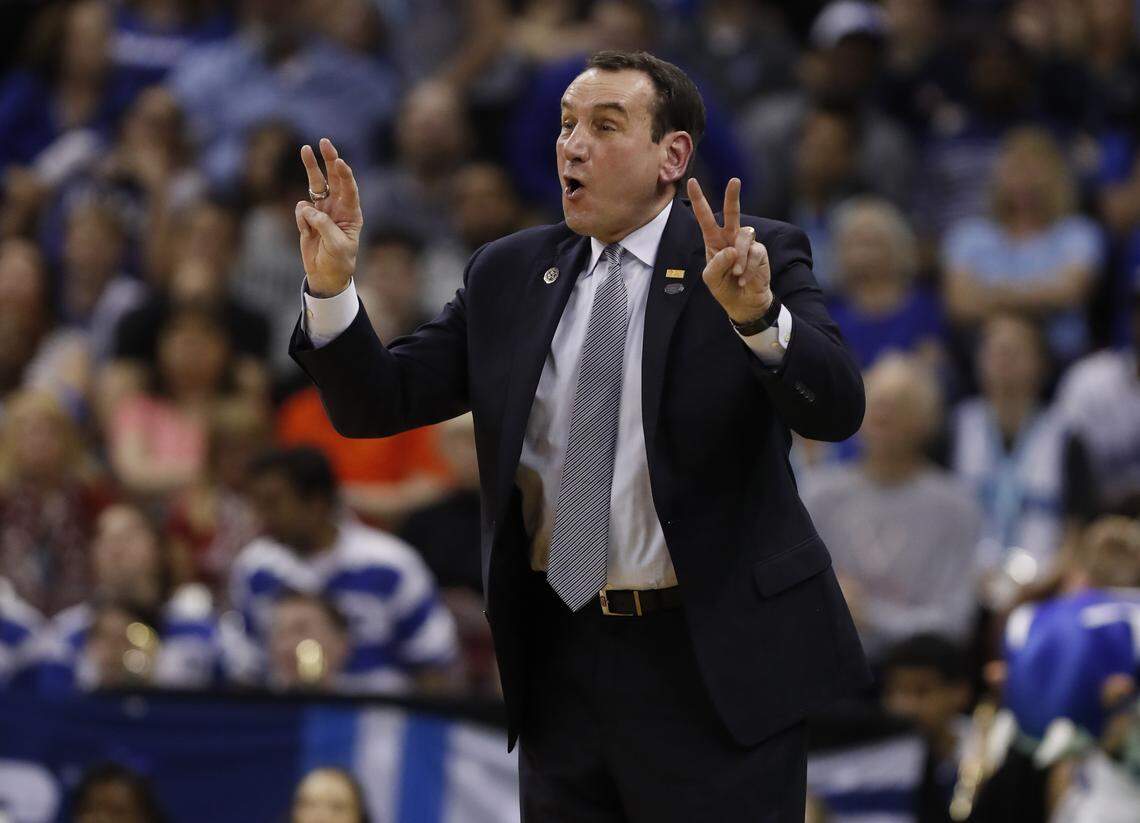 Duke head coach Mike Krzyzewski yells instructions to his team during the first half of Duke’s game against UCF in the second round of the NCAA Men’s Basketball Championship in Columbia, S.C., Sunday, March 24, 2019.