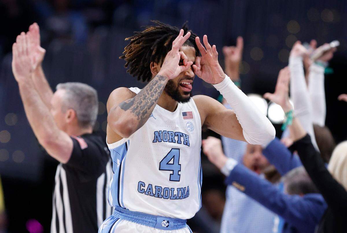 North Carolina’s RJ Davis (4) celebrates making a three-pointer during the second half of UNC’s 72-65 victory over Pitt in the semifinals of the 2024 ACC Men’s Basketball Tournament at Capital One Arena in Washington, D.C., Friday, March 15, 2024.