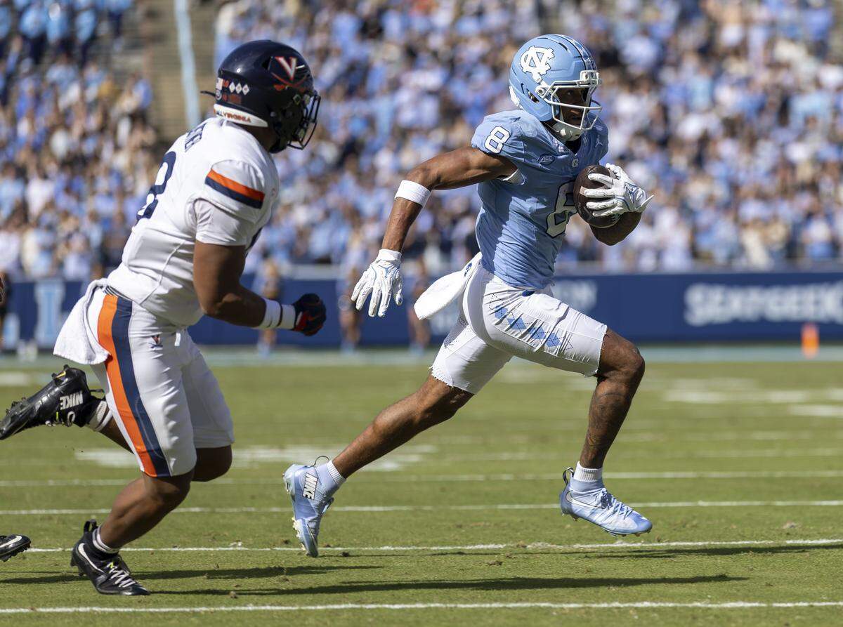 North Carolina wide receiver Kobe Paysour (8) breaks open after a pass completion for 13-yards from quarterback Gio Lopez in the first quarter against Virginia on Saturday, October 25, 2025 at Kenan Stadium in Chapel Hill, N.C. 