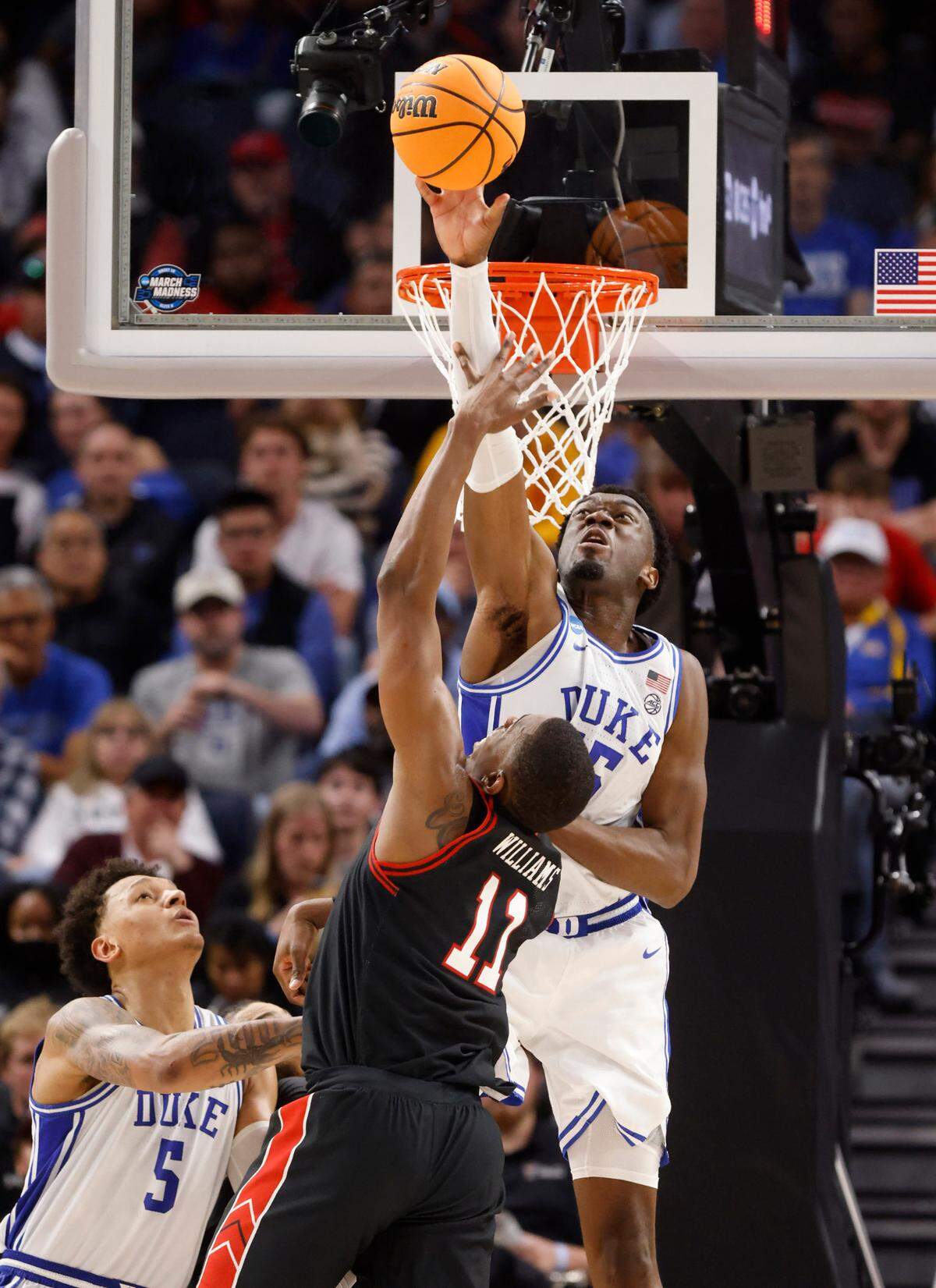 Duke’s Mark Williams (15) blocks the shot by Texas Tech’s Bryson Williams (11) late in the second half of Duke’s 78-73 victory over Texas Tech in the Sweet 16 round of the NCAA Tournament at the Chase Center in San Francisco, Calif., Thursday, March 24, 2022.