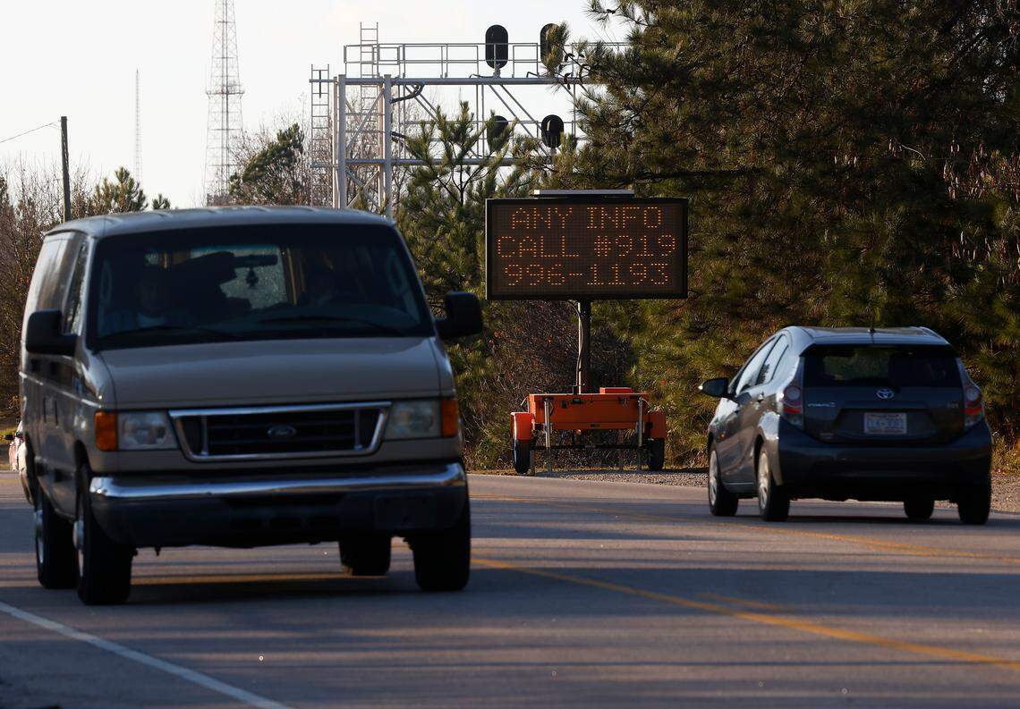 Motorists pass an electronic sign on Hillsborough Street in Raleigh, N.C. on Friday, Dec. 16, 2022, asking for the public’s help in the police investigation of a fatal hit and run that occurred on Nov. 25.