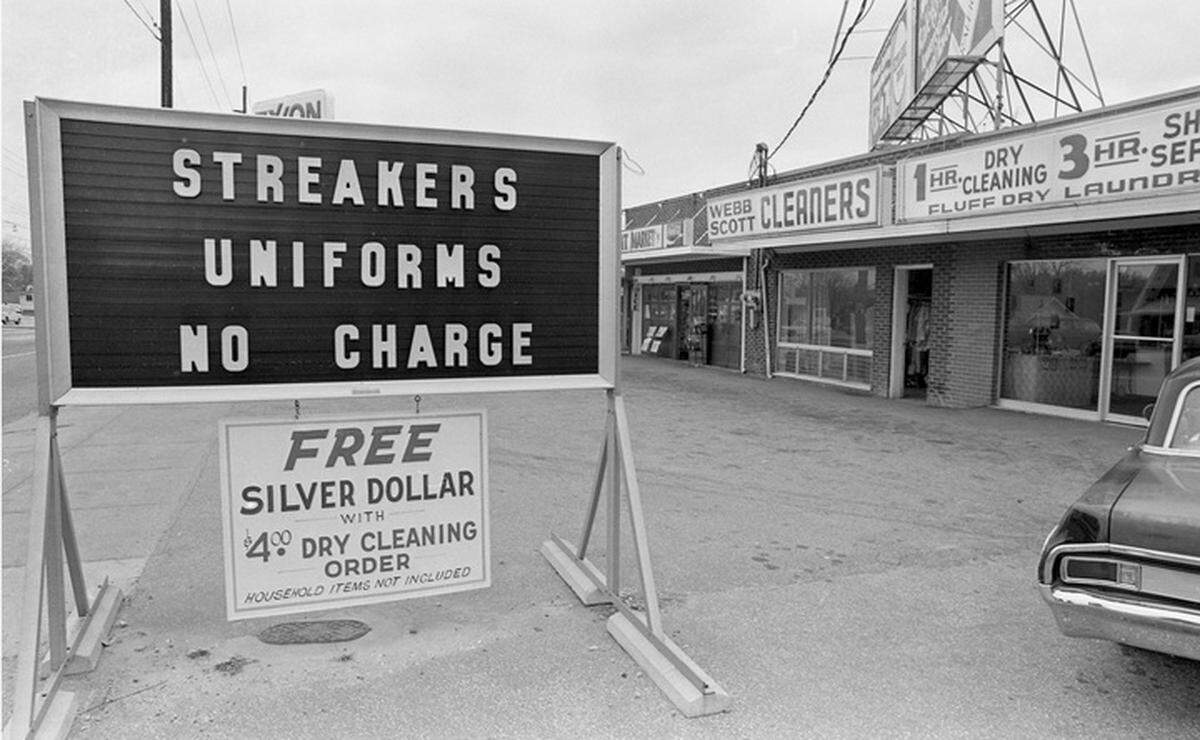 A Hillsborough Street sign in Raleigh reflects the streaking fad in 1974.