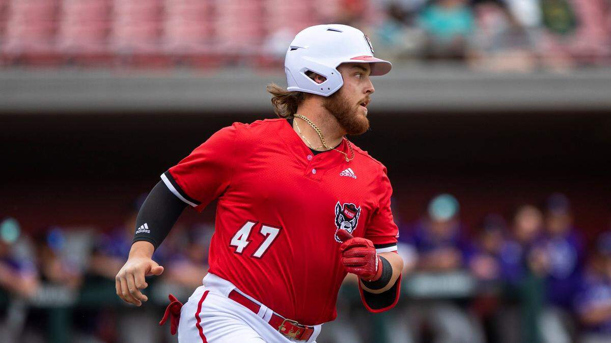 North Carolina State’s Tommy White (47) runs to first base during an NCAA baseball game on Tuesday, Feb. 22, 2022, in Raleigh, N.C. (AP Photo/Ben McKeown)
