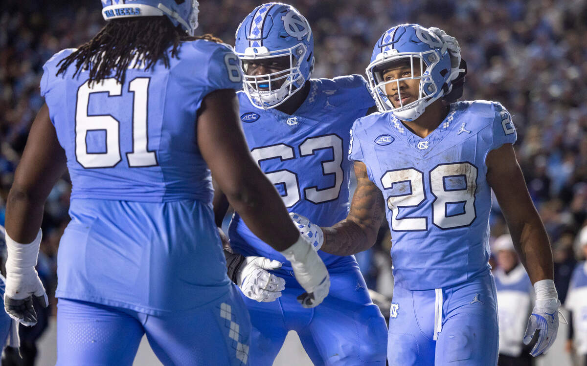 North Carolina running back Omarion Hampton (28) reacts after scoring a touchdown in the fourth quarter to take a 26-14 lead over Duke on Saturday, Nov. 11, 2023 at Kenan Stadium in Chapel Hill, N.C.